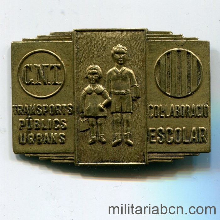 Insignia de metal de los Transports Públics Urbans CNT Col·laboració Escolar
