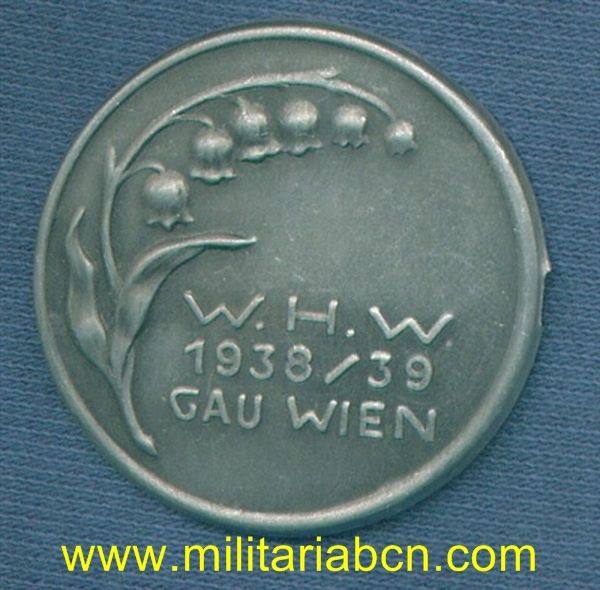Alemania III Reich. Insignia del Winterhilfe Werk. 1938-39. Wien. Sin aguja posterior.
