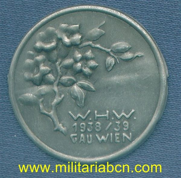 Alemania III Reich. Insignia del Winterhilfe Werk. 1938-39. Wien. Sin aguja posterior.