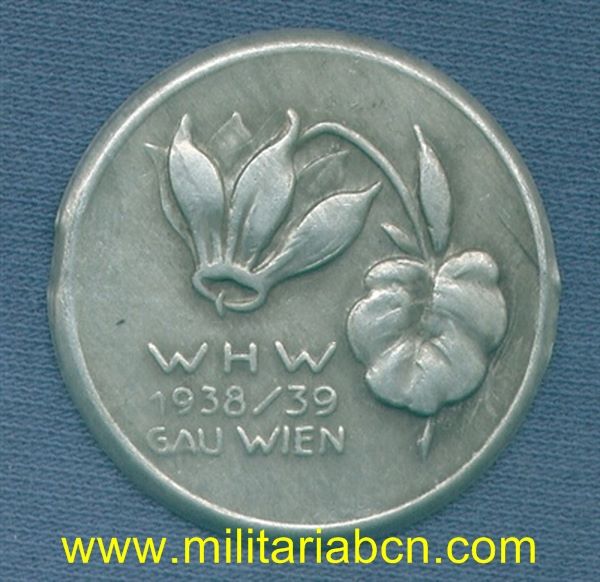 Alemania III Reich. Insignia del Winterhilfe Werk. 1938-39. Wien. Sin aguja posterior.